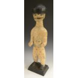 Tribal Art - a West African figure, possibly Akan, Ghana, he stands,