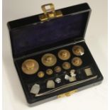 A set of scientific scale weights, for weighing fine fractions, bakelite case, 11.5cm wide, c.
