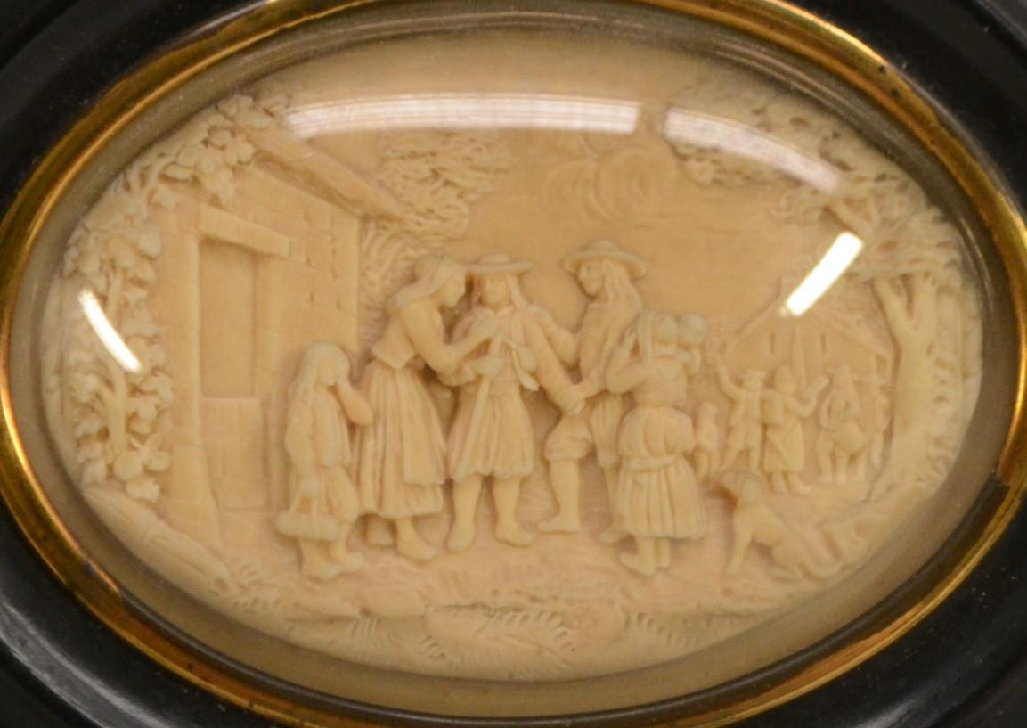 A 19th century wax picture, in relief with a genre scene, oval, 7cm x 9. - Image 2 of 3