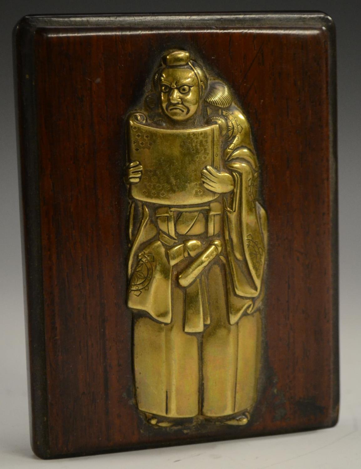 A Japanese bronze-mounted hardwood plaque, the front inset with a figural relief of an official,