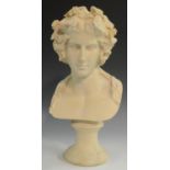 A 19th century style composition bust, of a classical maiden, her hair with a fruiting chaplet, 32.