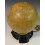 Cartography - an illuminated Phillips' British Empire Globe,