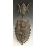 Tribal Art - a Baule mask, figurative superstructure, shaped border, 41cm long,