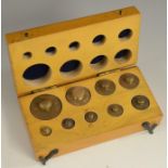 A set of brass scientific scale weights, from 100 to 1g, fitted beech case, 13.