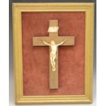 A Continental bone corpus christi, the cross 19cm long, claret velvet ground,