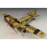 A German tinplate aeroplane, by Gunthermann,