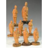 A collection of Chinese boxwood figures, carved as elders and figures of the court,