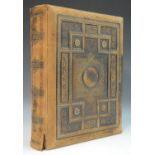 A Victorian family photograph album, comprising cabinet cards and cartes de visite,