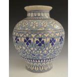 A Middle-Eastern ovoid vase,