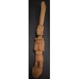 Tribal Art - an African house post, carved as a female guardian or ancestor figure,