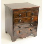 A 19th century rosewood miniature chest of collectors drawers,