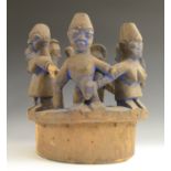 Tribal Art - a Bamileke carving, typically depicting a band of figures linking hands,
