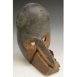 Tribal Art - a Dan Gegon bird mask, domed forehead, pronounced beak with hide covering, 24cm high,