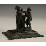 A 19th century French novelty table vesta, cast as a gentleman engaged in pugilism with a thief,