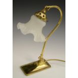 An Art Nouveau style brass adjustable swan neck desk or reading lamp,