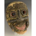 Tribal Art - a Bete mask, of concave plane, stylized features and traces of hide adornments, 21.