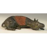 Tribal Art - a dark-patinated Benin bronze, of a recumbent pack animal,