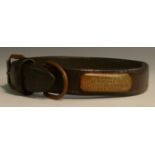 An early 20th century brass mounted leather dog collar, the owner's cartouche inscribed Lambert,