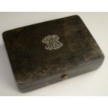 A 19th century rounded rectangular tortoiseshell box, hinged cover,