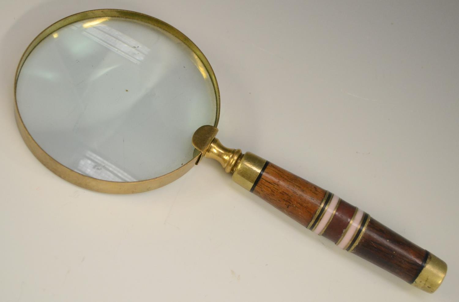 A brass connossieur's hand lens, the circular magnifying glass with banded haft, - Image 4 of 5