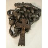 A set of French ebony rosary beads, stamped Souvenir De N-D De Lourdes, crucifix pendant,