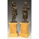 French School, 20th century, a pair, dark bronzes, Street Sellers, high marble bases,