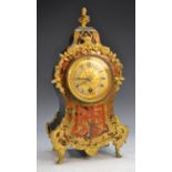 A 19th century French gilt metal mounted boulle work cartouche shaped mantel timepiece,