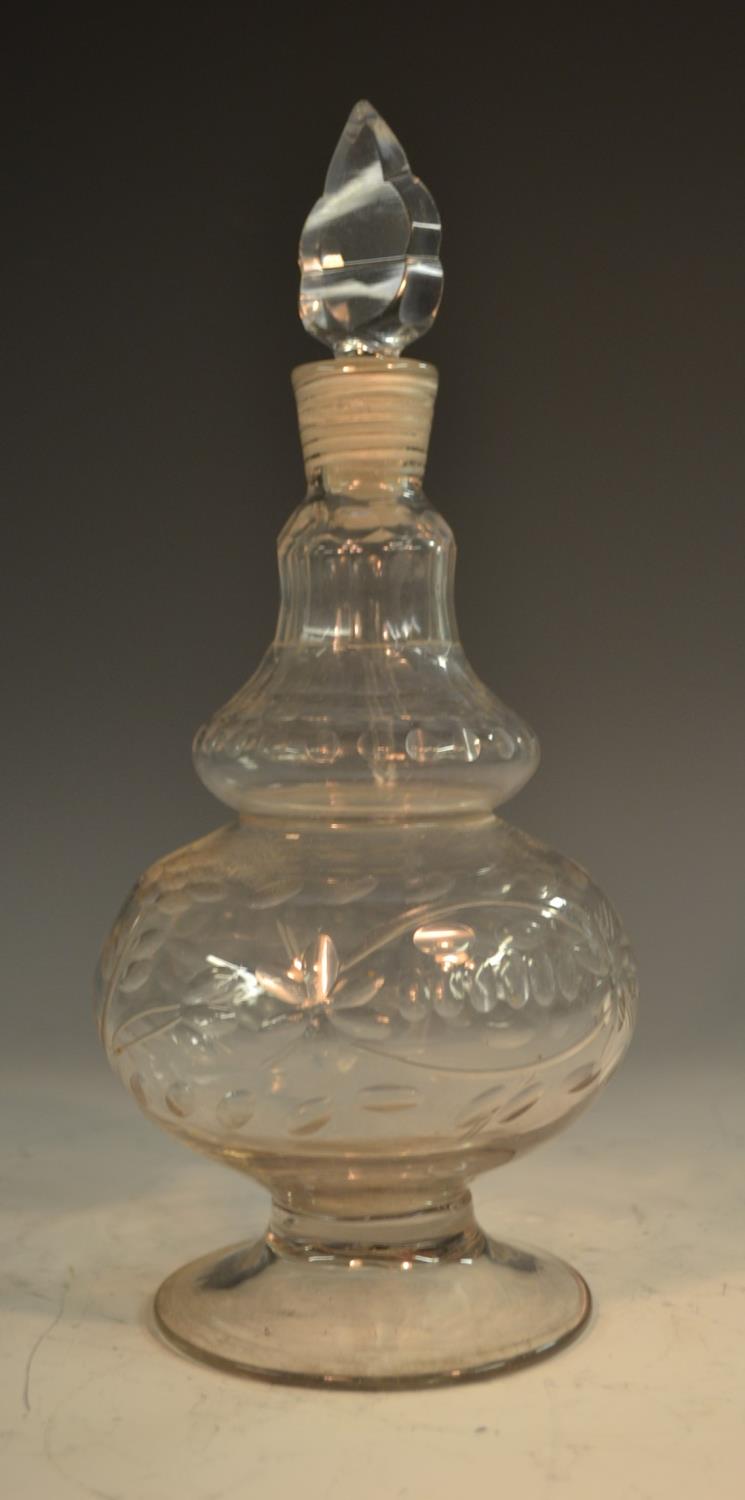 An unusual early 19th century minaret decanter, cut and faceted reservoir, neck and shoulder,