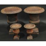 A pair of Victorian half-fluted campana garden urns, egg-and-dart rims, square bases, 63cm high,