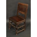 A 17th century oak wainscote back stool, rectangular panelled back,