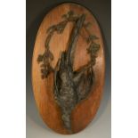 A 19th century cast bronze hanging dead game, pheasant, each naturalistically case,