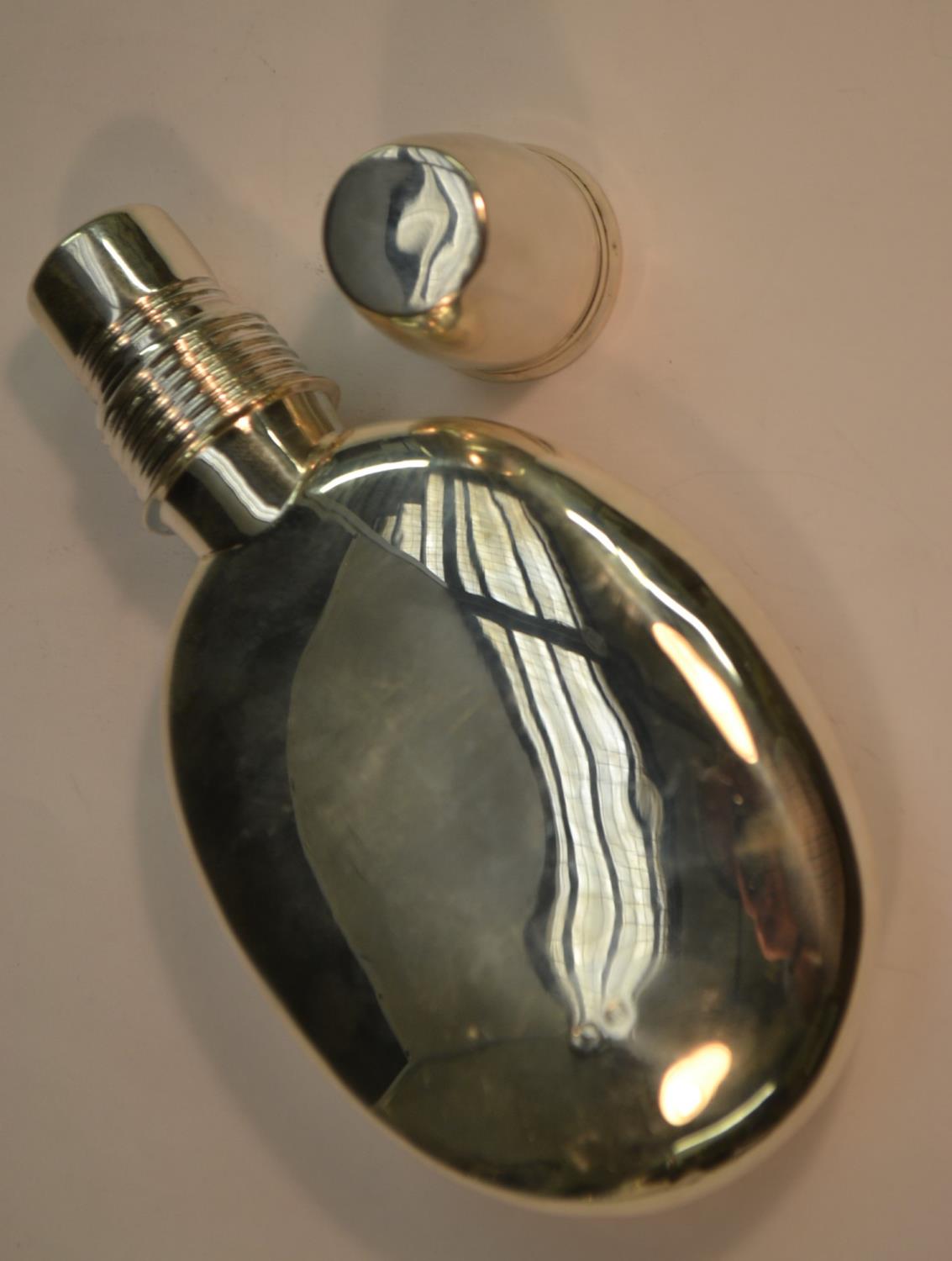 A Victorian silver huntsman's pocket flask, screw-fitting cover with stirrup-cup, 15cm long, - Image 3 of 3