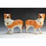 A pair of Staffordshire models of collie dogs, stand to left and right, 30cm long, c.