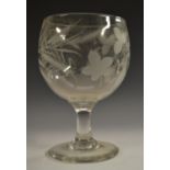 A substantial George III/IV century glass rummer, the bowl etched and engraved with hops,