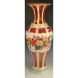 A large Bohemian ruby overlaid baluster vase, painted with flowers and foliage,