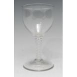 A George III opaque twist rummer glass, ogee-shaped bowl, double-helix stem, domed foot, pontil,