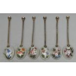 A set of six Elizabeth II silver-gilt and enamel seal top coffee spoons,