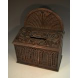 A 19th century oak country house post box, arched cresting,