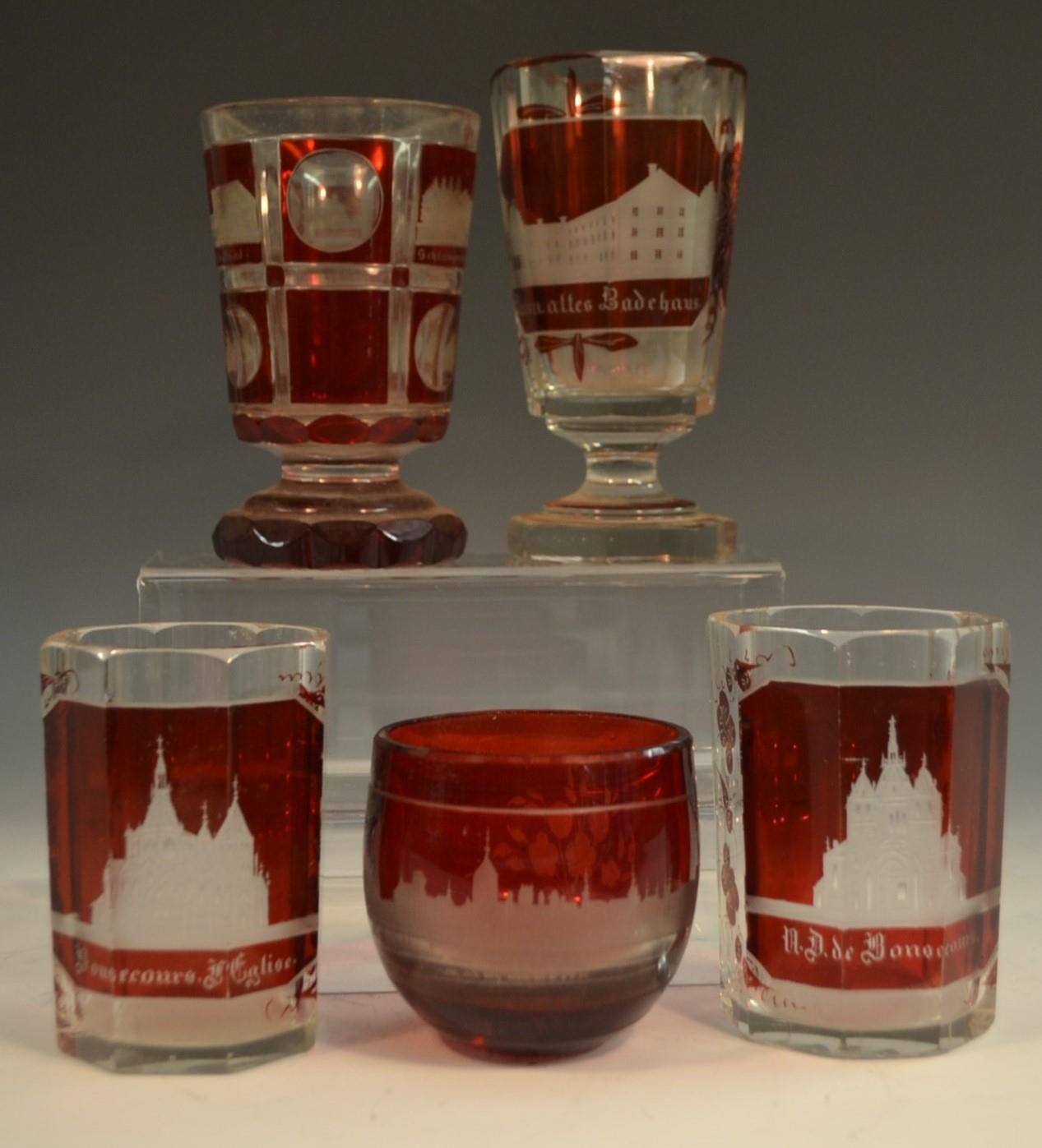 A 19th century Bohemian Named-View ruby and clear glass tapering octagonal goblet, Badehaus,