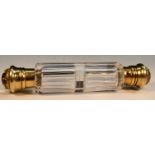 Asprey - a Victorian silver-gilt and Essex rock crystal mounted double-ended scent bottle,