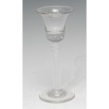 A late George II/early George III opaque twist cordial glass, short trumpet-shaped bowl,