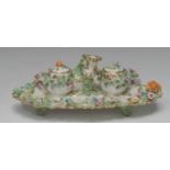 A Coalport style inkstand, with taper stick and two wells, painted with spring flowers,