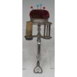 Sewing Interest - an early 19th century cut steel sewing clamp, trough cushion, hook,