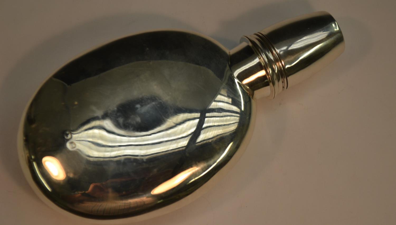 A Victorian silver huntsman's pocket flask, screw-fitting cover with stirrup-cup, 15cm long, - Image 2 of 3