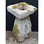 A 19th century Derbyshire gritstone staddle stone, square holed top,