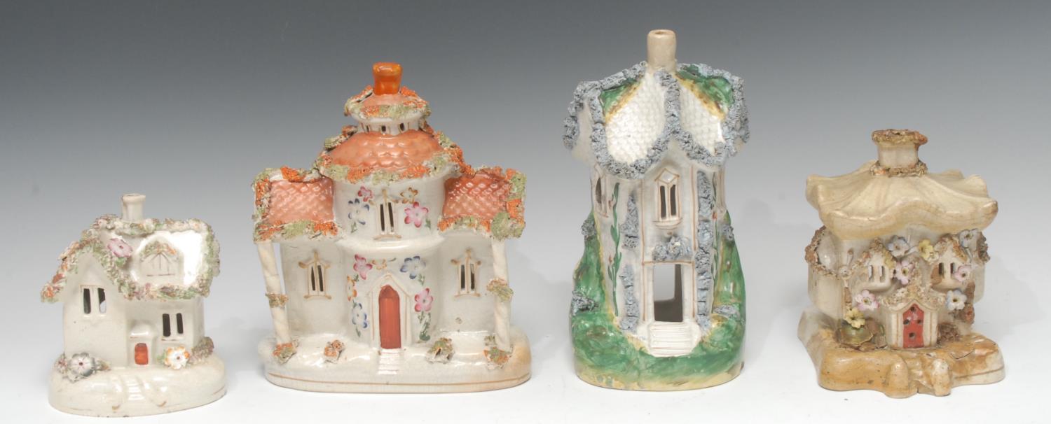 A 19th century Staffordshire cottage, applied with shredded clay, 24cn high, c.