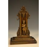 A Gothic Revival dark patinated bronze pocket watch stand, with provision for two watches,