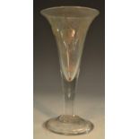 A large George III ale glass, the trumpet-shaped bowl etched and engraved with hops, domed foot,