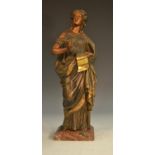 French School (19th century), a parcel gilt brown patinated bronze, of a Classical Muse,