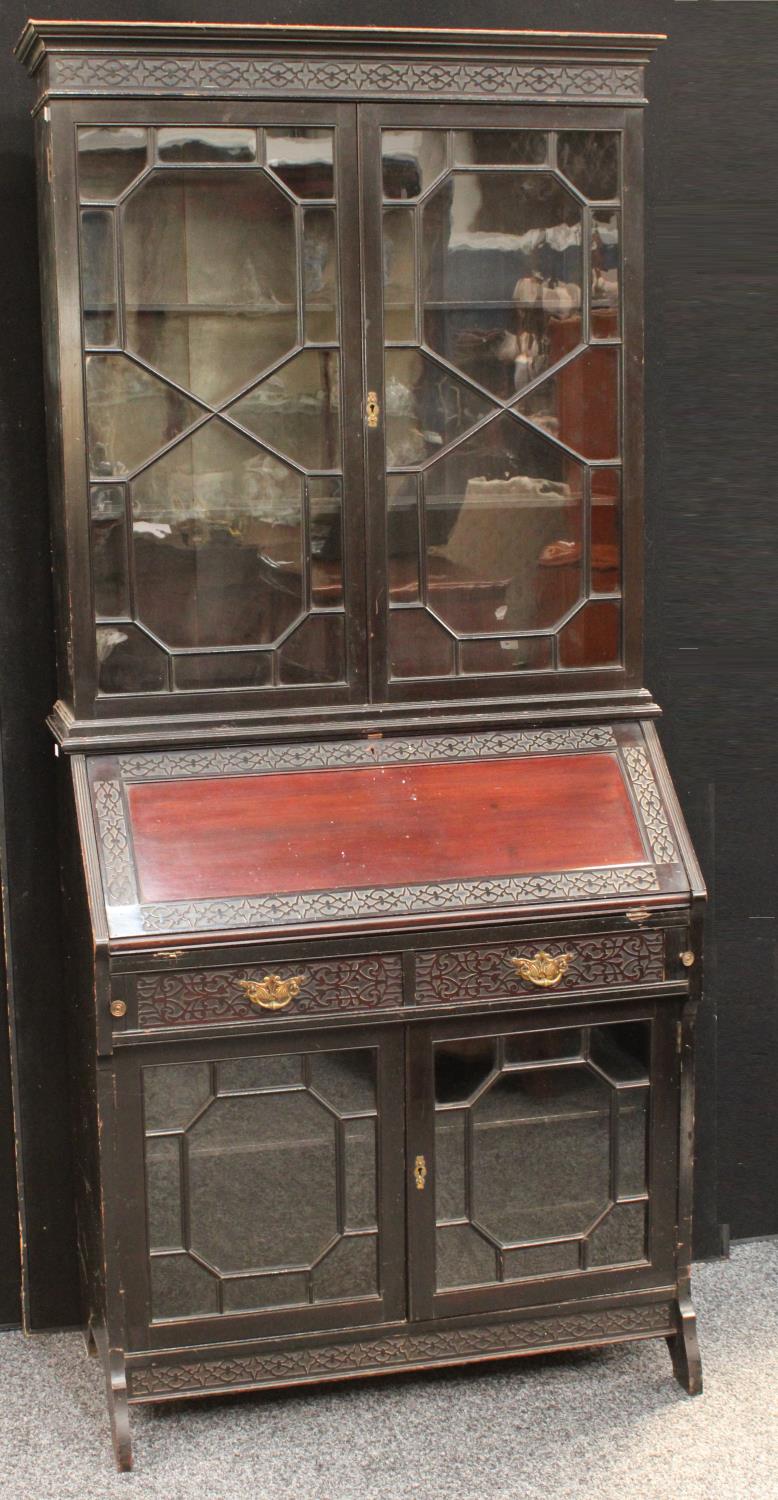 A Chinese Chippendale inspired ebonised bureau bookcase,